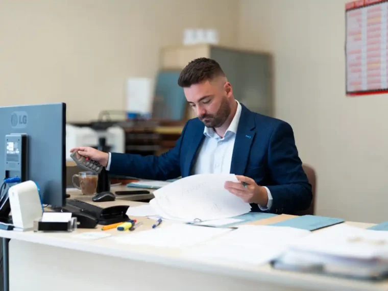 Photo of Lloyd working at the desk - Tax Services at PMP Accountants